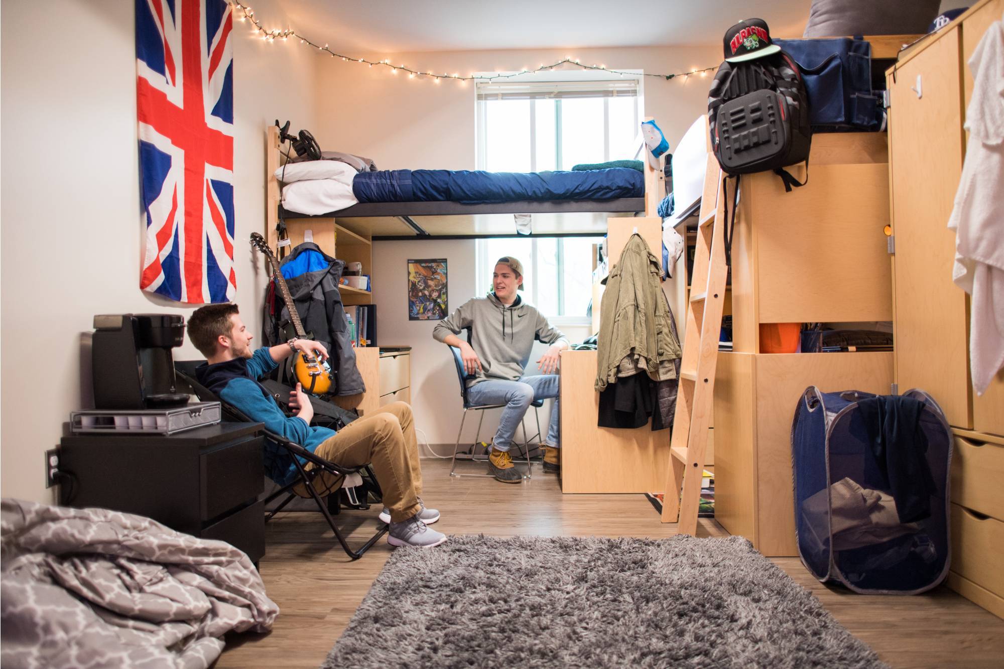 Cluster-style room with GVSU students.